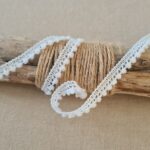 Mini pompons - Coloris Blanc neige 051